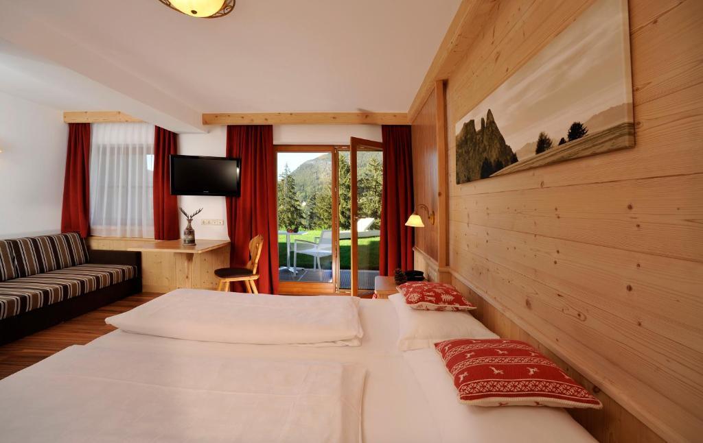 Hotel Digon Ortisei Rum bild