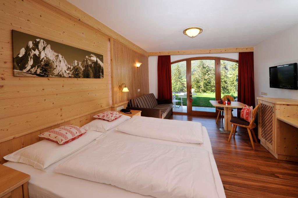 Hotel Digon Ortisei Rum bild